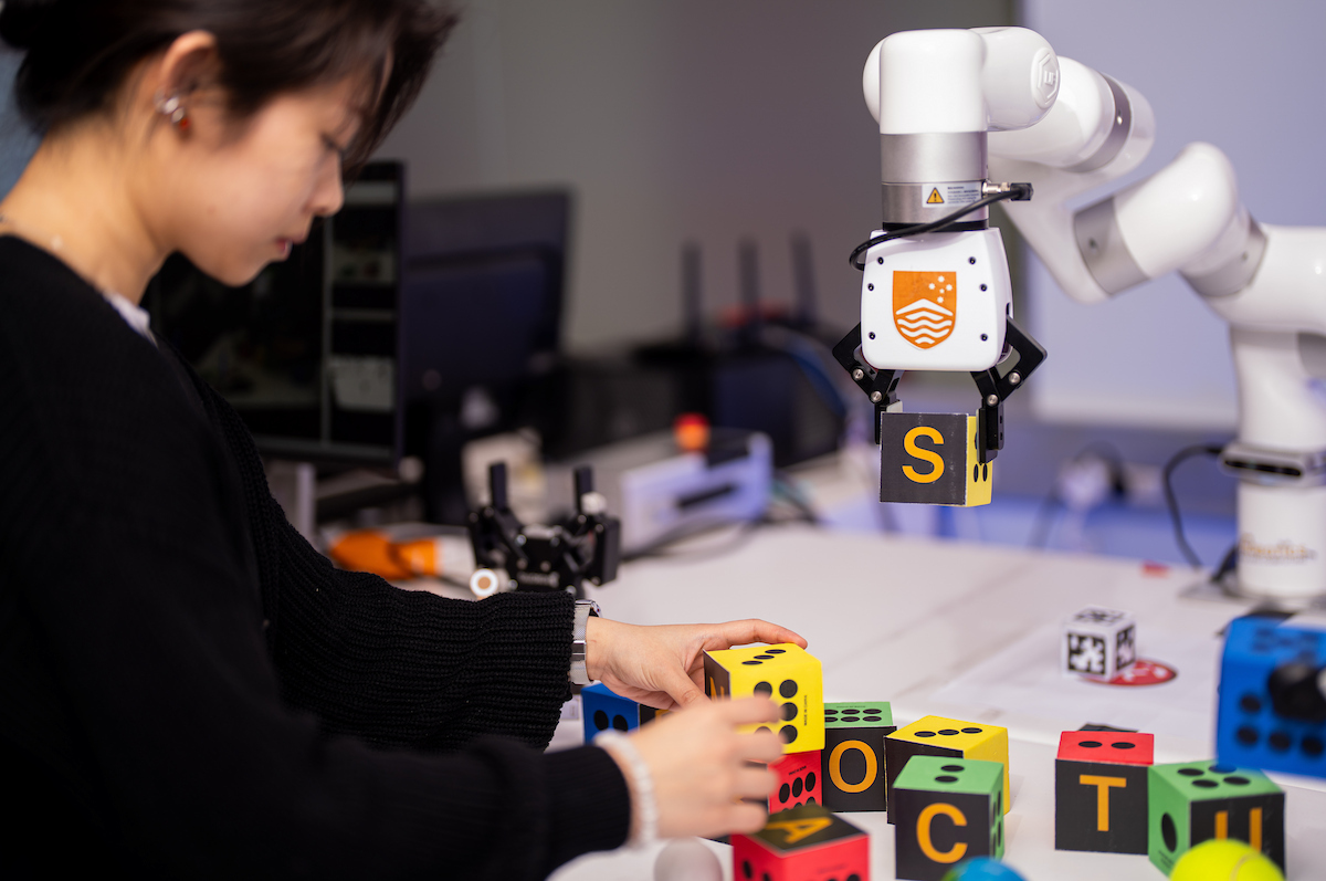 ANU Student in the robotics lab
